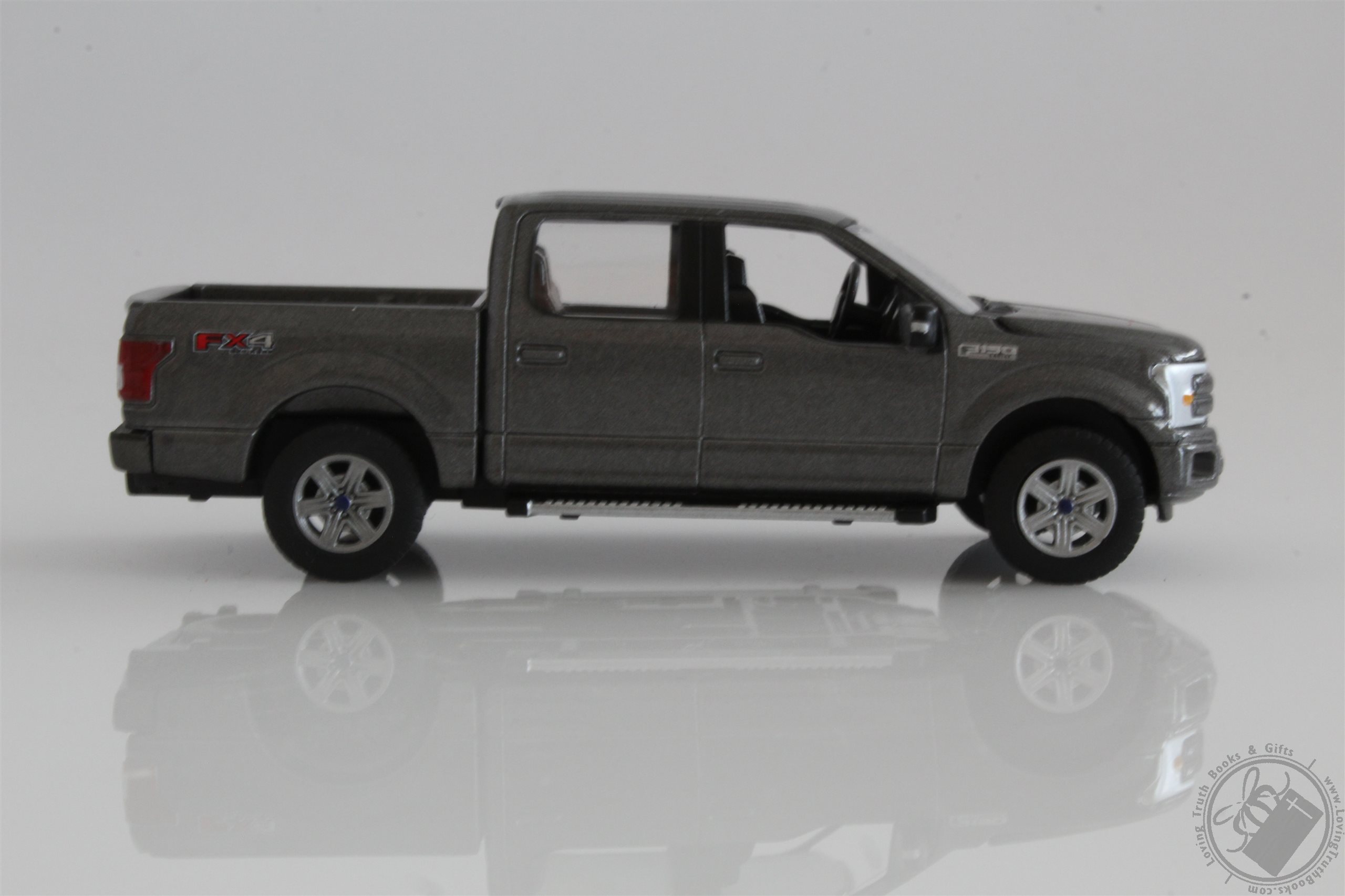 2018 Ford F150 Pickup Truck in Gunmetal by Auto World 164