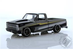 Auto World The Heartbeat of America - 1983 Chevy Silverado Fleetside - Baba Yaga Gray - Surplus Goodies / LBE Exclusive,Auto World